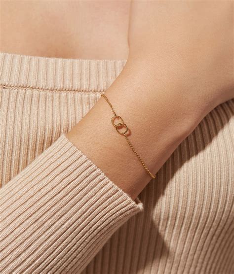 circle with line through it bracelet|interlocking circle bracelet.